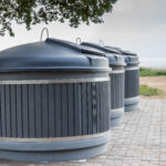 modern-trash-cans-round-containers-on-beach-for-se-2023-11-27-05-35-34-utc